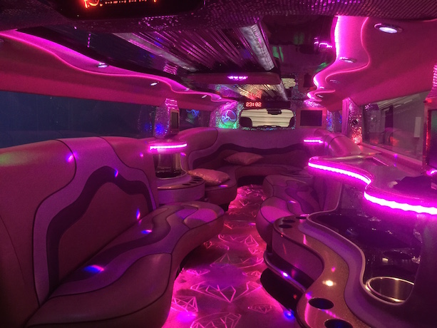 inside the sunset jewel hummer limo purple light