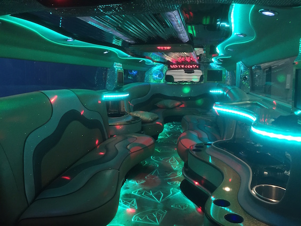 inside the sunset jewel hummer limo blue light