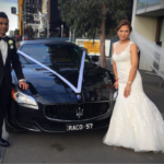 newly wed outside the limo